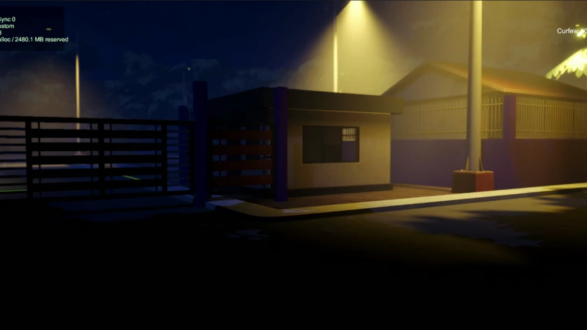 Nighttime BantayGabi guard post and subdivision entrance under street lights